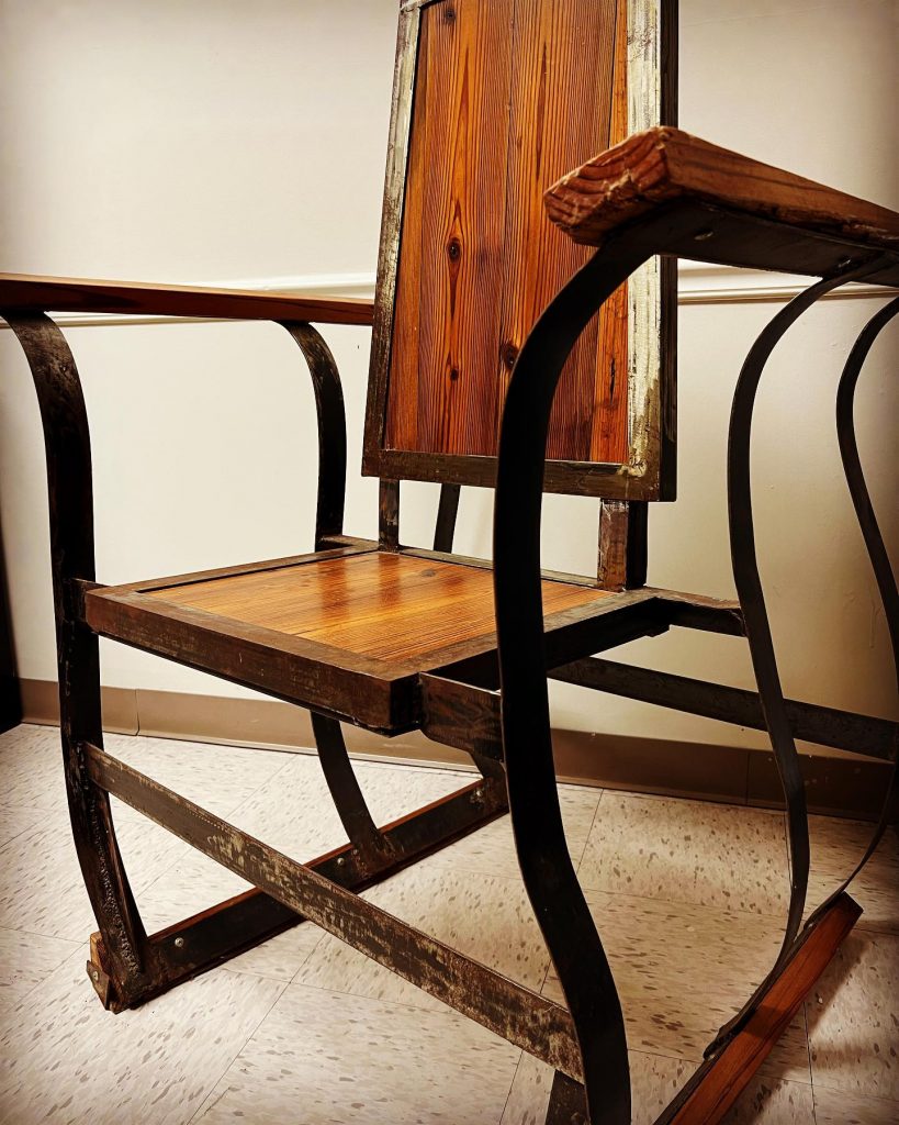 Steel and Wood Corrections Chair